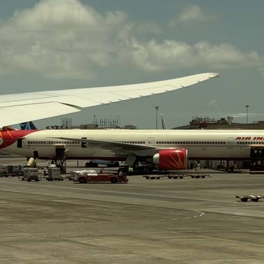 A Kuwait Airways A330 taxiing past the terminal at Mumbai